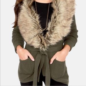 Olive green sweater with detachable collar.